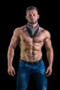 Muscular man with jeans and black bandanna Royalty Free Stock Photo