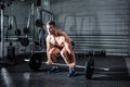 Muscular man lifting a barbell Royalty Free Stock Photo