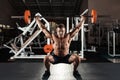 Muscular man lifting a barbell Royalty Free Stock Photo