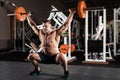 Muscular man lifting a barbell Royalty Free Stock Photo