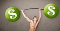 Muscular man lifting green dollar sign weights Royalty Free Stock Photo