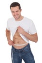 Muscular man measuring waist Royalty Free Stock Photo