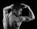 Muscular man posing in studio Royalty Free Stock Photo