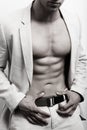 Muscular man with abs and suit Royalty Free Stock Photo