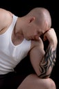 Muscular man with tattoo