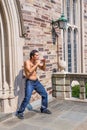 A muscular man is waving arms and exercising to counterattack Royalty Free Stock Photo