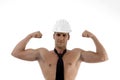 Muscular man wearing architect helmet
