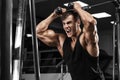 Muscular man working out in gym, bodybuilder strong male Royalty Free Stock Photo