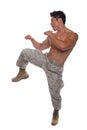 Muscular Marine in Karate Stance in Uniform