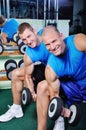 Muscular men exercising in a gym Royalty Free Stock Photo