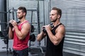 Muscular men exercising with kettlebells Royalty Free Stock Photo