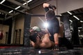muscular MMA boxers fighters fight in fights without rules in ring octagons