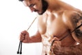 Muscular fitness model with jumping rope Royalty Free Stock Photo