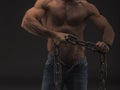Muscular man with big chain only in jeans. Strong nude male body with veins Royalty Free Stock Photo