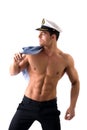 Muscular shirtless male sailor with marine hat Royalty Free Stock Photo