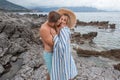 muscular shirtless man hugging and kissing beautiful happy young girlfriend Royalty Free Stock Photo