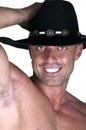Muscular smiling cowboy Royalty Free Stock Photo