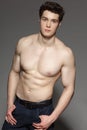 Muscular sportsman posing shirtless