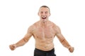 Muscular strong man fighter excited to win showing tighten muscles