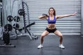 Muscular woman exercising with kettlebell Royalty Free Stock Photo