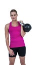 Muscular woman exercising with kettlebell Royalty Free Stock Photo