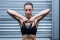 A muscular woman lifting kettlebells Royalty Free Stock Photo