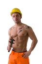 Muscular young construction worker shirtless with hardhat Royalty Free Stock Photo