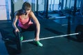 Muscular young fitness woman lifting a weight crossfit in the gym. Fitness woman deadlift barbell. Crossfit woman Royalty Free Stock Photo