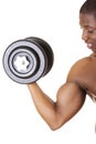 Muscular young man lifting weights Royalty Free Stock Photo