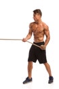 Muscular Young Man Pulling A Rope