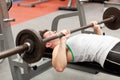 Muscular young man using weightlifting Royalty Free Stock Photo