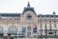 Musee d`Orsay or Orsay museum building facade with clock in a cloudy day in Paris, France Royalty Free Stock Photo