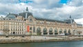 The musee d'Orsay is a museum in Paris timelapse, on the left bank of the Seine. Paris, France Royalty Free Stock Photo