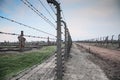 Museum Auschwitz - Birkenau. Holocaust Memorial Museum. Barbed wire and fance around a concentration camp. Royalty Free Stock Photo