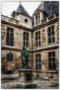 Museum Carnavalet in Marais district in Paris, France . Statue of Louis Fourteen. Royalty Free Stock Photo