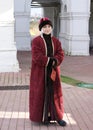 Museum guide in ornate traditional Russian garmentsat Kolomenskoye, Moscow