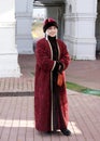 Museum guide in ornate traditional Russian garmentsat Kolomenskoye, Moscow