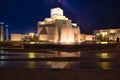 Museum of Islamic Art in Doha Qatar exterior night shot showing fountain in foreground