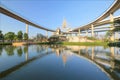 A museum by the lake in Lat Pho Park under Bhumibol Bridge Bridge (or Industrial Ring Road) in Bangkok, Thailand Royalty Free Stock Photo