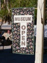 Cloth museum open sign