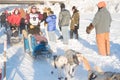 Musher Ryne Olson waves to fans.