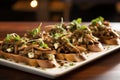 mushroom bruschetta on a diners table