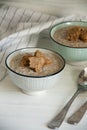 Mushroom cream soup with bread crumbs in two deep bowls Royalty Free Stock Photo