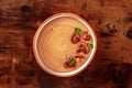 Mushroom cream soup, overhead shot on a rustic wooden background Royalty Free Stock Photo