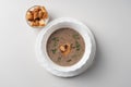 Mushroom cream soup puree with croutons top view Royalty Free Stock Photo