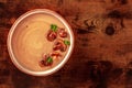 Mushroom cream soup, shot from the top on a dark rustic wooden background Royalty Free Stock Photo