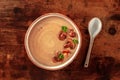 Mushroom cream soup, shot from the top on a dark rustic wooden table Royalty Free Stock Photo