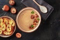 Mushroom cream soup with various mushrooms and toasted bread Royalty Free Stock Photo