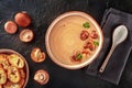 Mushroom cream soup with various mushrooms and toasted bread Royalty Free Stock Photo