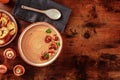 Mushroom cream soup with various mushrooms and toasted bread Royalty Free Stock Photo